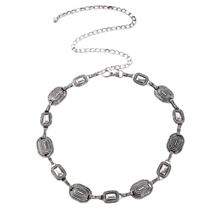 Bohemian silver metal waist chain with embossed oval links and adjustable tail