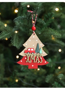Close-up of wooden Xmas hanging ornament on tree with warm bokeh light background