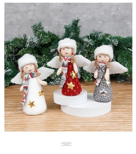 Three angel dolls with knit hats and plaid scarves as festive Christmas tree ornaments