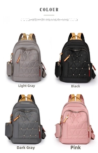 Detalle de mochilas de tela Oxford en gris, negro y rosa con pespuntes acolchados y remaches