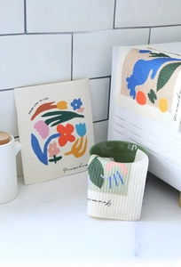 Detail of Nordic floral wood pulp sponges showing soft texture and high water absorption