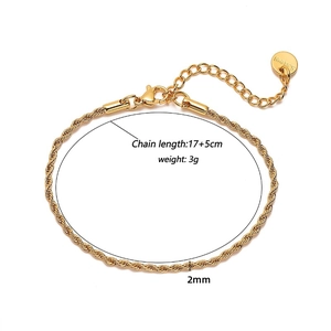 Detail of 2mm golden stainless steel rope chain with lobster clasp and extension link