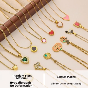 Detailed display of titanium steel gold necklaces with diverse heart and eye pendants