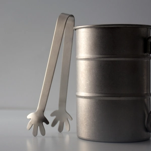 Nordic stainless steel sugar tong with palm-shaped head and matching metal cup