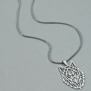 Punk hollow wolf head pendant necklace for men in silver stainless steel on grey fabric