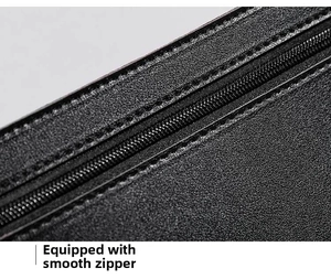 Detail of a large capacity women's clutch with smooth zipper and fine stitching