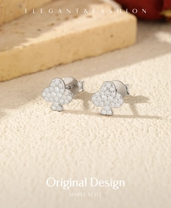 Macro view of D color moissanite S925 sterling silver club shaped hip hop earrings