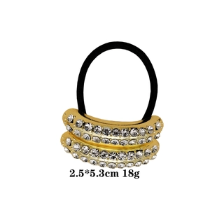Elegant gold ponytail holder with double arc crystal rhinestones on black elastic band