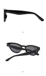 Detailed side and back view of cat-eye sunglasses with black frame and metal rivets