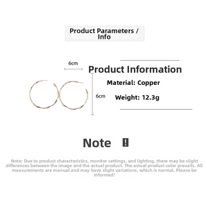Macro view of 6cm gold-plated wave-textured hoop earrings with size and weight details