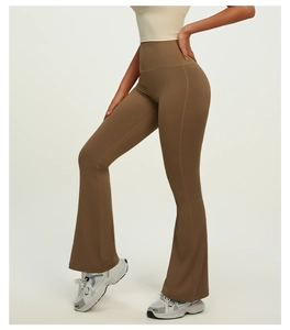 Detail of high-waisted flared yoga pants in coffee brown with premium shaping fabric