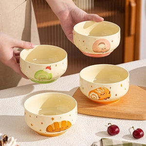 Set of four cartoon ceramic bowls in cream color with cute food illustrations for home use