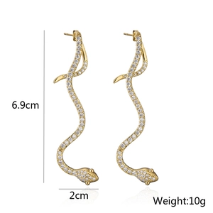 Detailed specs of 18K gold snake earrings showing 6.9cm length and zircon stones