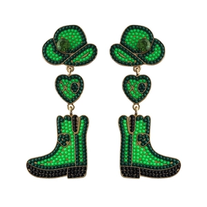 Detailed close-up of beaded cowboy boot earrings with green hat and heart charms