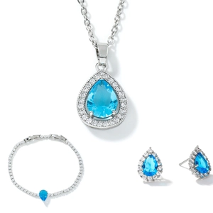 Elegant silver jewelry set with pear-shaped blue stones and sparkling zirconia accents