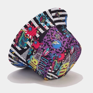 Detail of vintage canvas bucket hat with 80s graffiti prints and retro pattern elements