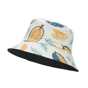 Double-sided bucket hat with tropical durian fruit print on cream cotton fabric