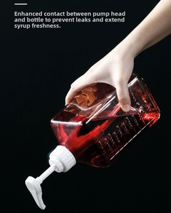 Detail of 1100ml syrup glass bottle with embossed scale and 10-30ml quantitative pump head