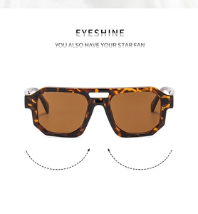 Detail view of double bridge tortoiseshell aviator sunglasses with brown square lenses