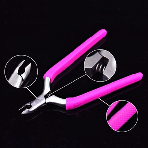 Detail view of cuticle nipper showing precision blades, dual spring and non-slip handle