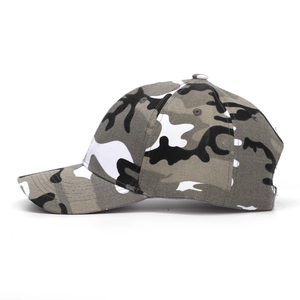 Detail view of cotton camouflage baseball cap showing six-panel stitching and curved brim
