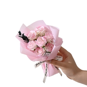 Pink soap rose bouquet with baby's breath and Just For You ribbon in hand