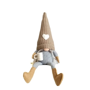 Knitted faceless gnome doll with coffee cup and heart pattern for Christmas home decor