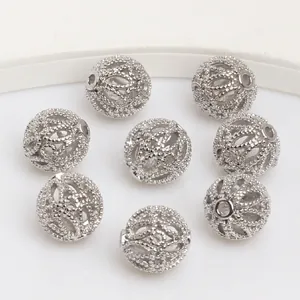Cuentas esféricas huecas en oro de 14k con patrones geométricos para joyería de bricolaje