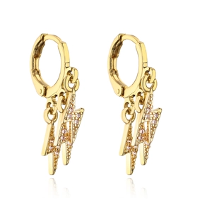 Golden lightning bolt earrings with pink zircon accents on white background
