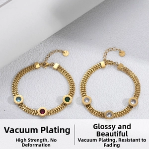 Detail of golden stainless steel wheat chain bracelets with colorful zircon inlays