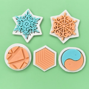 5-piece geometric silicone mold set featuring snowflake and yin-yang patterns for DIY baking