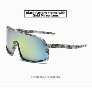 Detail of cycling sunglasses with marble patterned frame and gold mercury gradient lens