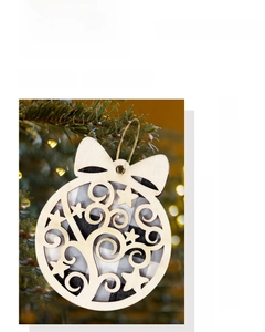 Detail showing a circular wooden Christmas ornament with star cutout and plaid pattern
