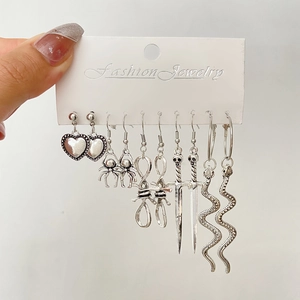 6 pairs of vintage gothic silver earrings featuring heart, spider, and sword designs
