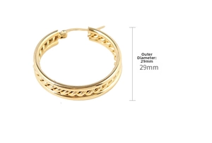 Detailed macro view of 29mm gold twisted hoop earrings with a textured spiral finish