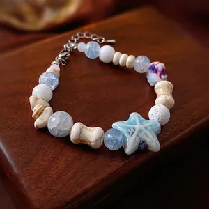 Bracelet perlé œil de chat macaron éléphant feuille avec breloque étoile bleue et extension
