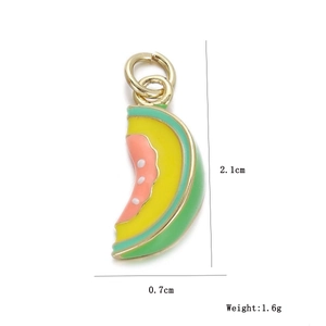 Detailed view of a watermelon enamel copper pendant charm with measurements 2.1x0.7cm