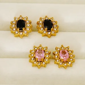 Sparkling sunflower stud earrings with zircon crystals in pink and black oval settings