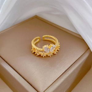 Elegant gold open ring featuring heart-shaped zircon stones and crown design detail