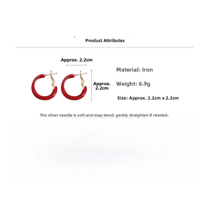 Detail view of 22mm red enamel hoop earrings with silver pins and size specifications