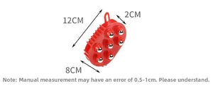 Macro detail of red handheld massager with 7 stainless steel roller balls and dimensions