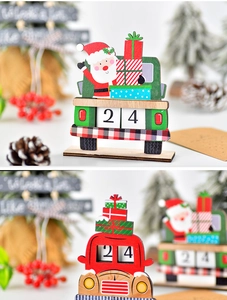 Detailed view of handmade wooden Christmas advent calendar with Santa driving a gift truck