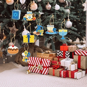 Hanukkah hanging ornaments including Menorah and Star of David on a festive holiday tree