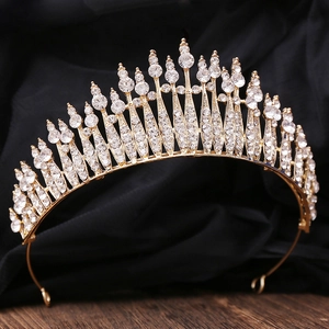 Luxurious bridal tiara with sparkling crystals and rhinestones on a gold metal base