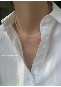 Close-up of 3mm small freshwater pearl choker necklace with 14K gold filled details