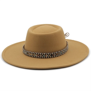 Detail of khaki flat top wool felt hat with ethnic woven band and brown cord trim
