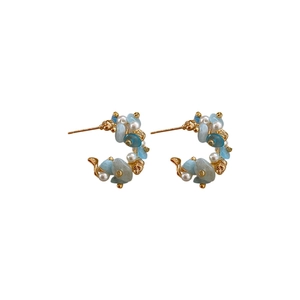 Elegant C-shaped pearl earrings with aquamarine floral stones and golden metal finish