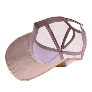 Pink ponytail baseball cap with glitter brim and breathable mesh back for sun protection