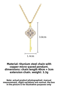 Detailed view of lucky clover key pendant with sparkling zircons and dimensions info