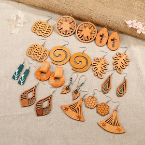 Set of 14 pairs of hollow wooden earrings in geometric and nature-inspired shapes